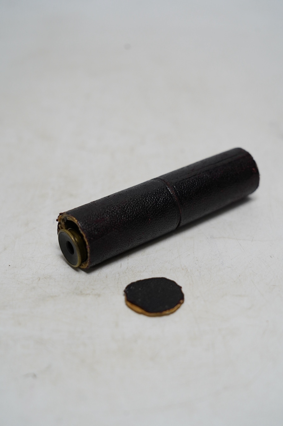 A late 19th century brass pocket spectroscope, engraved ‘John Browning London’. Condition - fair